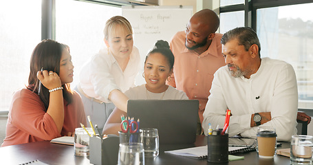 Image showing Laptop, collaboration and meeting with a business team working together on a project in the office. Teamwork, computer and diversity with a man and woman employee group talking in the boardroom