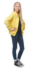 Image showing Fashion, portrait and girl child model in a studio with a trendy, cool and stylish teenager outfit. Beauty, full body and vertical shot of a casual young kid with a smile isolated by white background