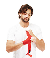 Image showing Red tape on hand, man and mma with fitness and martial arts, boxing for exercise and safety against white background. Sport motivation, fist and fight with athlete, boxer workout with protection