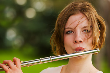 Image showing Playing the flute