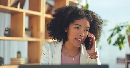 Image showing Phone call, communication and business woman with a laptop for networking, planning and creative work in an office. Advertising, talking and African employee on a mobile for a strategy for a startup