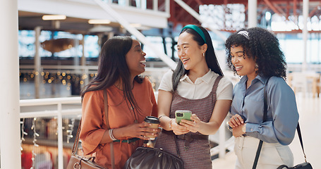 Image showing Friends, smartphone and social media with women at shopping mall, meme and comedy with technology and communication on day out. Diversity, laugh and excited about comic online, phone and network.