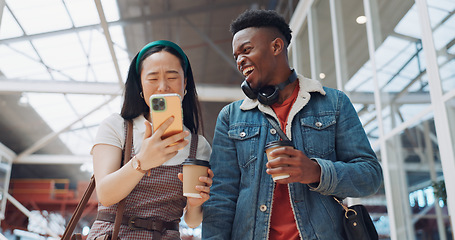 Image showing Shopping mall, smartphone and couple of friends on social media, website or blog for discount, sales and travel communication. Diversity gen z people walking, using phone or cellphone and coffee cup