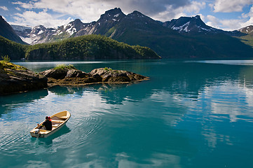 Image showing Small boat on fjord