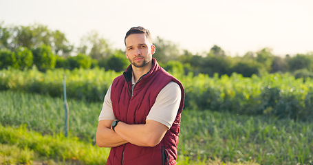 Image showing Portrait, sustainability and farmer man working outdoor on grass field or land. Arms crossed, agriculture or profesional farming male, worker or business owner from usa, career in the farm industry