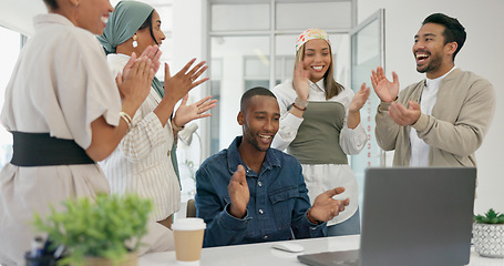 Image showing Success, applause and black man with proposal in office at startup business with proud team. Congratulations, cheering and support for winner target achievement with employees clapping hands at desk.