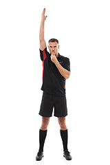 Image showing Man, sports referee and blowing whistle with hand up for warning, penalty or fail in studio. Fitness coach, sign of mistake and error or soccer rules for competition game isolated on white background