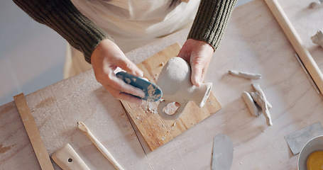 Image showing Pottery, art and senior asian woman mold clay in home studio or workshop. Potter, artist and retired female from Japan practicing arts, craft and hobby creating mug, cup or handmade ceramic bowl.