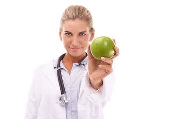 Image showing Doctor, studio portrait and woman with apple for nutrition, wellness and health by white background. Happy isolated nutritionist, fruit and advice for healthcare, natural diet and healthy food