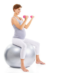 Image showing Fitness, exercise and pregnant woman weightlifting on ball for maternal wellness, healthy lifestyle and wellbeing. Sports, pregnancy and girl in workout, training and pilates with dumbbells in studio