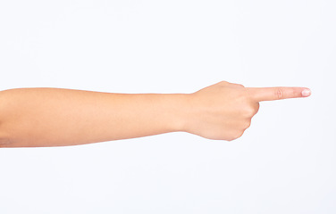 Image showing Finger, point and hand in studio for direction, discipline or blame expression or mockup. Arm, pointing and person with forearm for hand gesture for showing or directing isolated by white background.