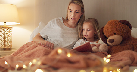 Image showing Story, book and reading mother with child in bedroom for child education, home learning or language development together. Mom and girl kid with creative literature for kindergarten with lamp lights