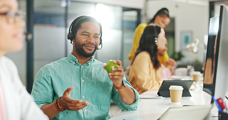 Image showing Call center, customer service and a business black man writing in a notebook while working on a computer for sales. Computer, contact us and support with a male employee at work as a consultant