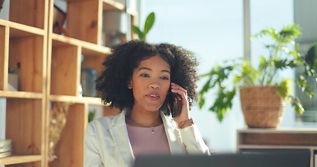 Image showing Phone call, communication and business woman with a laptop for networking, planning and creative work in an office. Advertising, talking and African employee on a mobile for a strategy for a startup