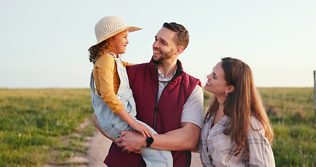 Image showing Family, mother and father with girl, on holiday and in countryside together being relax, happy and smile. Portrait, mom and dad holding daughter or child on vacation, enjoy fresh air and bonding.