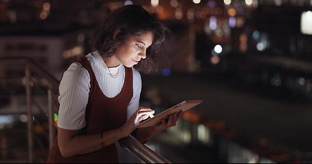 Image showing Startup, data analysis or business woman on tablet at night on office balcony for communication, networking or social media. Rooftop, creative or girl with tech for 5g network, search or web review