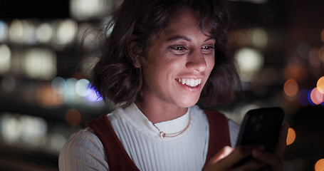 Image showing Search, night and phone with business woman in city for communication, social media and networking. Internet, technology and digital with face of girl on rooftop for app, data and email in New York