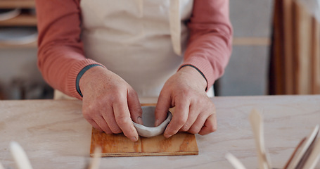 Image showing Pottery, clay bowl and craftsman hands in artist studio, workshop and small business of creative product manufacturing. Ceramic designer, artisan and sculpture skill, mold shape and handmade process