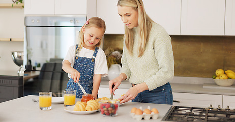 Image showing Breakfast, morning and mother and kid cooking, help or prepare croissant meal, fruit or food in home kitchen. Love, happy family and youth girl with mom, mama or woman enjoy fun quality time and bond