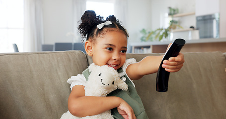 Image showing Relax, toy and girl watch television with remote for chill leisure time alone in home on sofa. Tv program, streaming and subscription decision and choice with cartoon for entertainment on home sofa