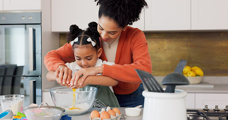 Image showing Mother, child and baking with eggs in the kitchen for family bonding, learning and fun with ingredients at home. Happy mom teaching helpful kid to bake, cook or mix for recipe together at the house