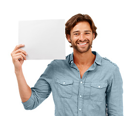 Image showing Portrait, man and poster in studio for mockup, marketing or advertising space isolated on white background. Face, banner and happy male holding blank paper for logo, branding or advertisement mock up