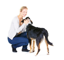 Image showing Love, pets and woman with dog and smile on white background with mockup and product placement. Best friends, happy woman and animal playing and training with pet care and loyalty together in studio.