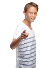 Image showing Children, portrait and pointing with a boy in studio isolated on a white background for branding or marketing. Kids, hand and point with a male child on blank mockup space for advertising a logo