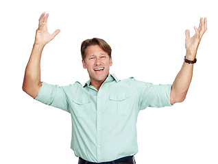 Image showing Portrait, man and hands in air, excited and celebration for achievement with guy isolated on white studio background. Male person, entrepreneur and confident gentleman cheering, happiness and winning