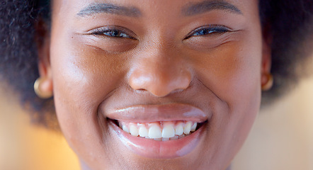 Image showing Confident and proud black woman smiling, showing strength and dignity. Closeup of the face and head of a beautiful young african american female showing her teeth with a big smile and feeling happy