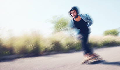 Image showing Motion blur, skateboard and mockup with a sports man skating outdoor on an asphalt street at speed. Balance, fast and mock up with a male skater on a road for fun, freedom or training outside