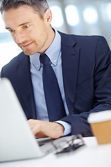 Image showing Office, typing and man accountant working on a statistics report on a laptop for a finance company. Success, technology and vertical shot of a businessman planning financial proposal in the workplace