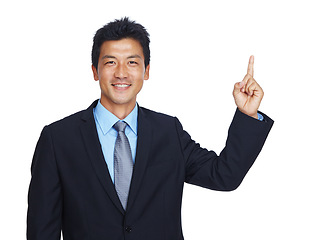 Image showing Happy businessman, portrait or pointing up hand on isolated white background at finance sale or mockup deal. Smile, worker or corporate asian showing marketing space, advertising or promotion mock up