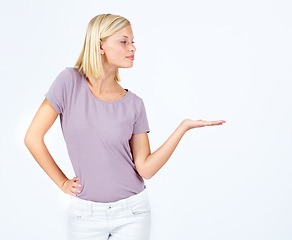 Image showing Woman, showing and hand for marketing space, advertising mock up and product placement mockup on studio background. Model, hand gesture and promotion for sales deal, logo branding and about us design