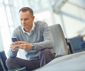 Image showing Travel, research or business man with phone for invest strategy, finance growth or financial review. CEO, airport or manager with smartphone for planning, data analysis or investment economy search