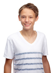 Image showing Boy, kid and happy portrait in studio, white background and isolated alone. Face, smile and young child, model and casual kids lifestyle for healthy growth, youth development and confident happiness