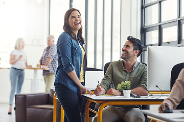 Image showing Woman, businessman and funny conversation at startup office, desk and friends at web design company. Creative leader, man and modern office with comic, happy talk and team building at job in New York