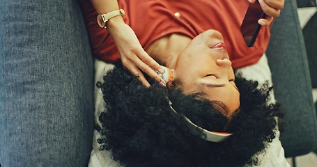 Image showing Headphones, listening and dance of black woman on a sofa excited for subscription service, technology and home connection. Happy, relax and girl portrait dancing on couch while listening to music app