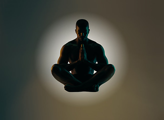 Image showing Meditation art, silhouette or relax man meditate for spiritual mental health, chakra energy balance or soul healing. Zen mindset peace, mindfulness or shadow model float isolated on studio background