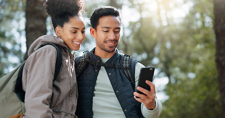 Image showing Couple, hiking and selfie, outdoor and travel, black woman and man together out in nature with technology and backpacking in woods. Hiker on adventure, relationship and photo with smartphone.