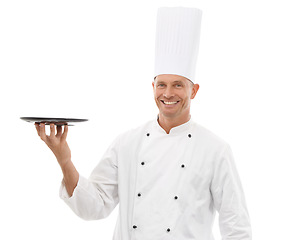 Image showing Chef holding tray, confident portrait and smile presenting promo or restaurant product placement isolated on white background Happy executive cook man in uniform, mock up and menu launch in studio.