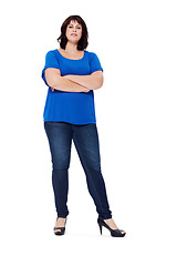 Image showing Arms crossed, confident and portrait of a woman with a vision on a white background in studio. Fashion, elegant and clothing model with confidence, high heels and arms folded on a studio background