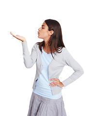 Image showing Hand, kiss and advertising with a business woman in studio isolated on a white background for marketing. Product, brand and logo with an attractive young female kissing blank space for branding