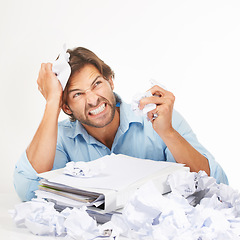 Image showing Business, paper and man angry, stress and frustrated with mental health, documents and employee isolated on white studio background. Writer, paperwork and worker upset, annoyed with work and burnout