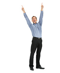 Image showing Businessman winner in portrait with success, cheers and achievement, arms in air against white background. Happy man, professional win and excited, corporate celebration with growth and bonus mockup