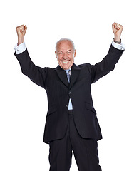 Image showing Studio portrait, senior businessman and celebration with fist hand, excited and white background. Elderly corporate leader, isolated ceo and smile to celebrate, motivation and hands in air with suit