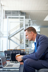 Image showing Email, coffee and businessman with a laptop for work, communication and internet. Business, working and employee reading news, information and corporate chat on a computer with tea in an office