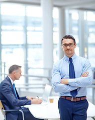 Image showing Portrait, vision and mindset with a business man in his office standing arms crossed in a confident pose. Growth, mission and management with a male employee at work for future success in corporate