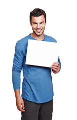 Image showing Man portrait, blank poster and mockup space for advertisement, marketing and sales sign. White background, isolated and empty board of a person in a studio for advertising with a smile and mock up