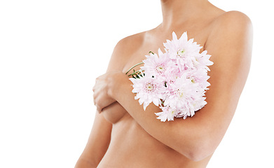 Image showing Flowers, body and beauty with a woman in studio covering her breasts on a white background for cancer awareness. Wellness, nude and luxury with a female posing to promote natural breast health